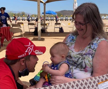 Julie Nichols with her son Brady Ellison and grandchild.